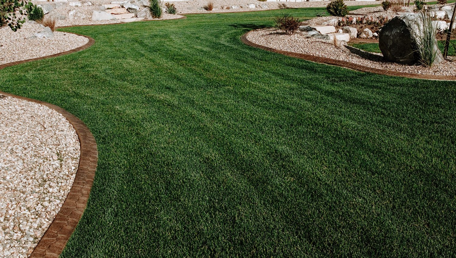 Lawn Fertilization & Weed Control | Elite Lawn Care - Landscaping & Lawn Services